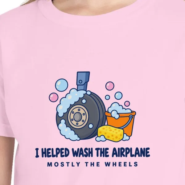 airplane-wash-helper-kids-tee-blossom-chest Close-up of the Airplane Wash Helper design on the Blossom kids tee, Comfort Colors 9018 youth tee, with the neckline