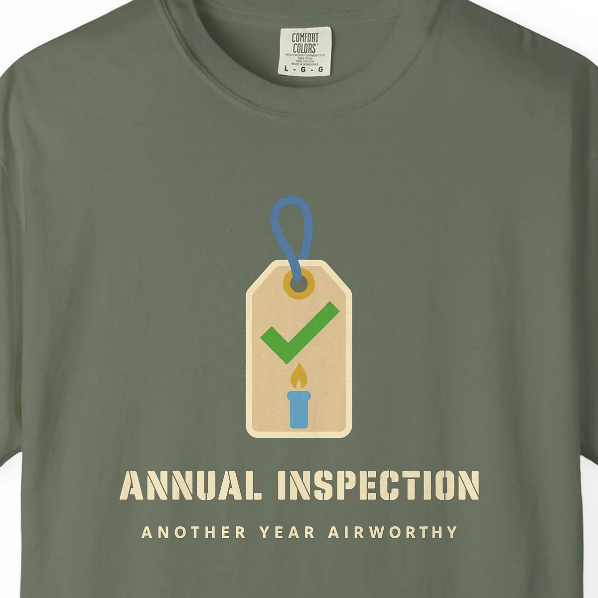 Annual Inspection Tee in Moss, close-up