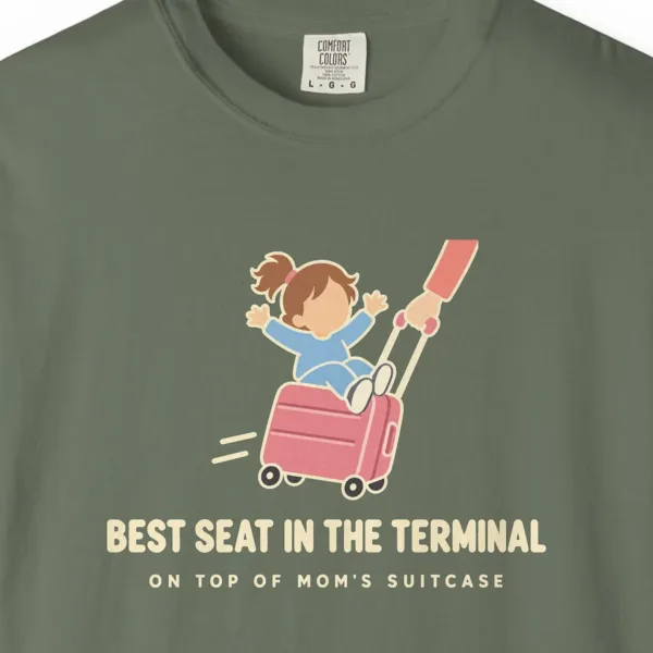 best-seat-in-the-terminal-tee-moss-chest Best Seat in the Terminal Tee in Moss, close-up