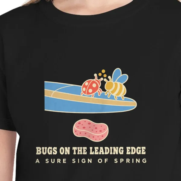 Close-up of the Bugs on the Leading Edge design on the Black kids tee, Comfort Colors 9018 youth tee, with the neckline