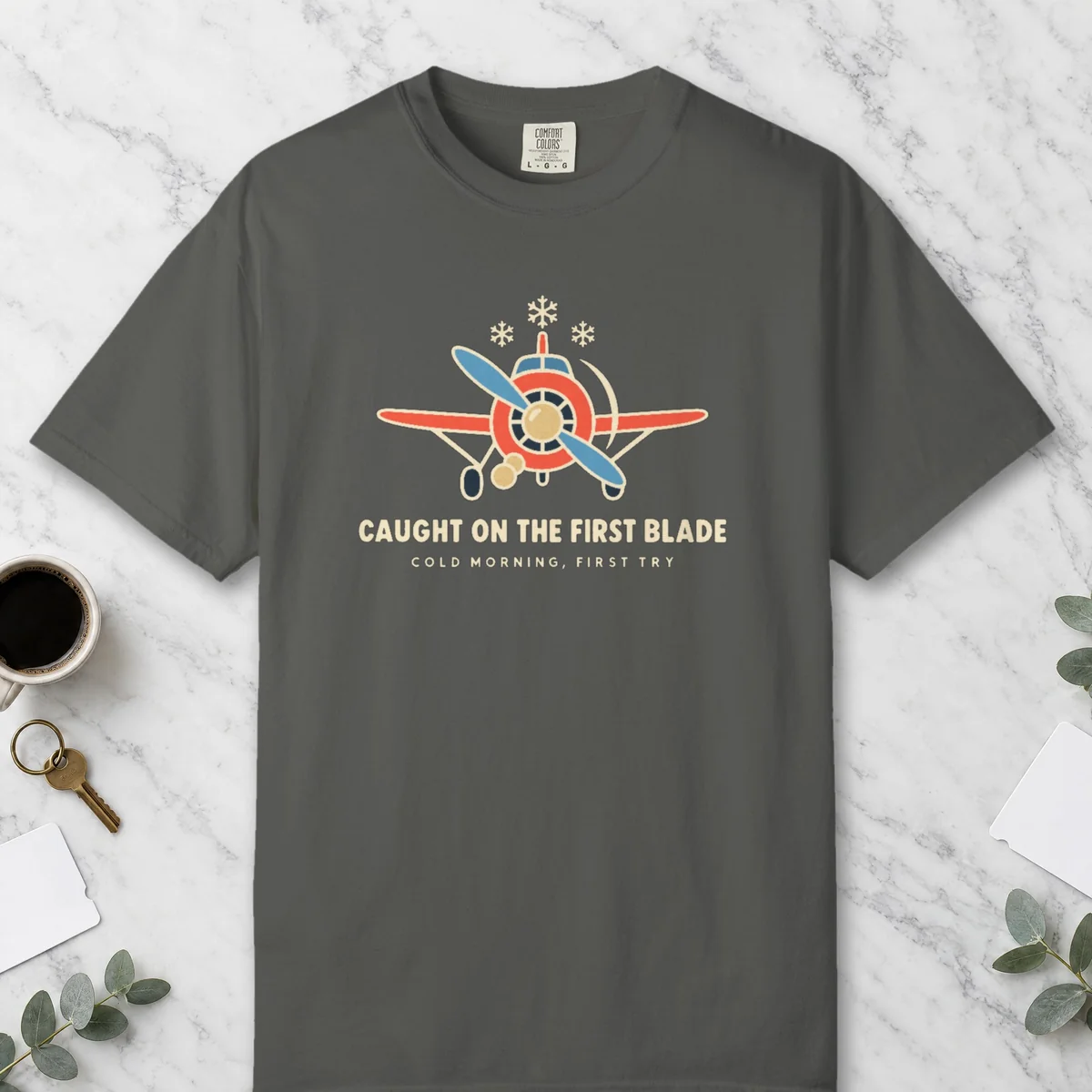 Caught on the First Blade Tee in Pepper, front view
