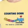 Close-up of the Counting Down to Dad design on the Butter kids tee, Comfort Colors 9018 youth tee, with the neckline