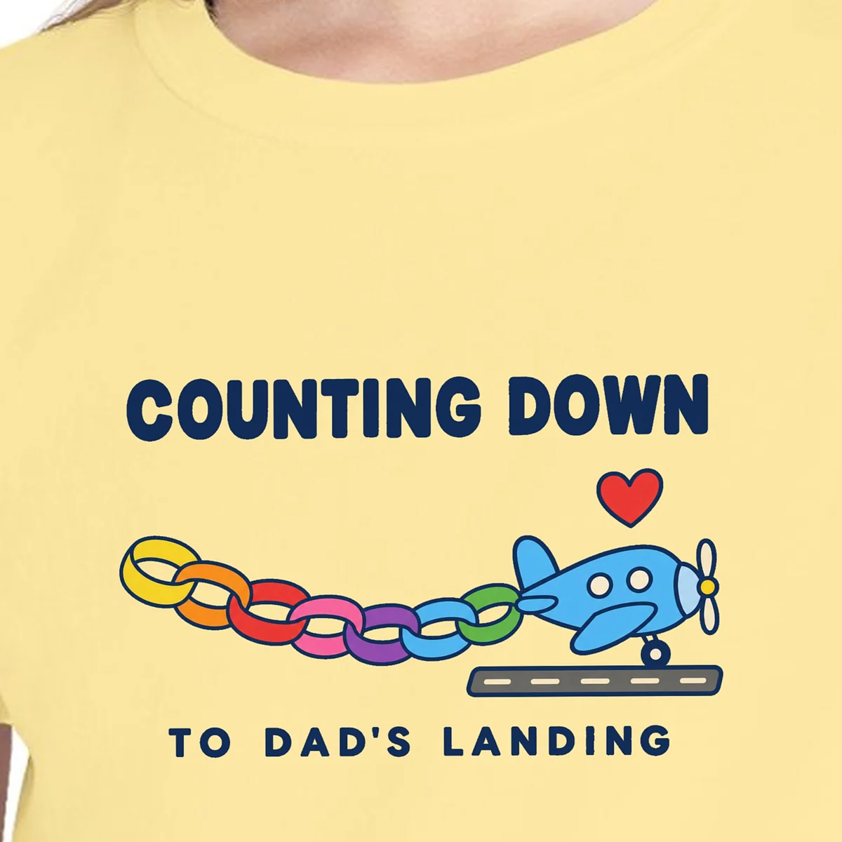 Close-up of the Counting Down to Dad design on the Butter kids tee, Comfort Colors 9018 youth tee, with the neckline