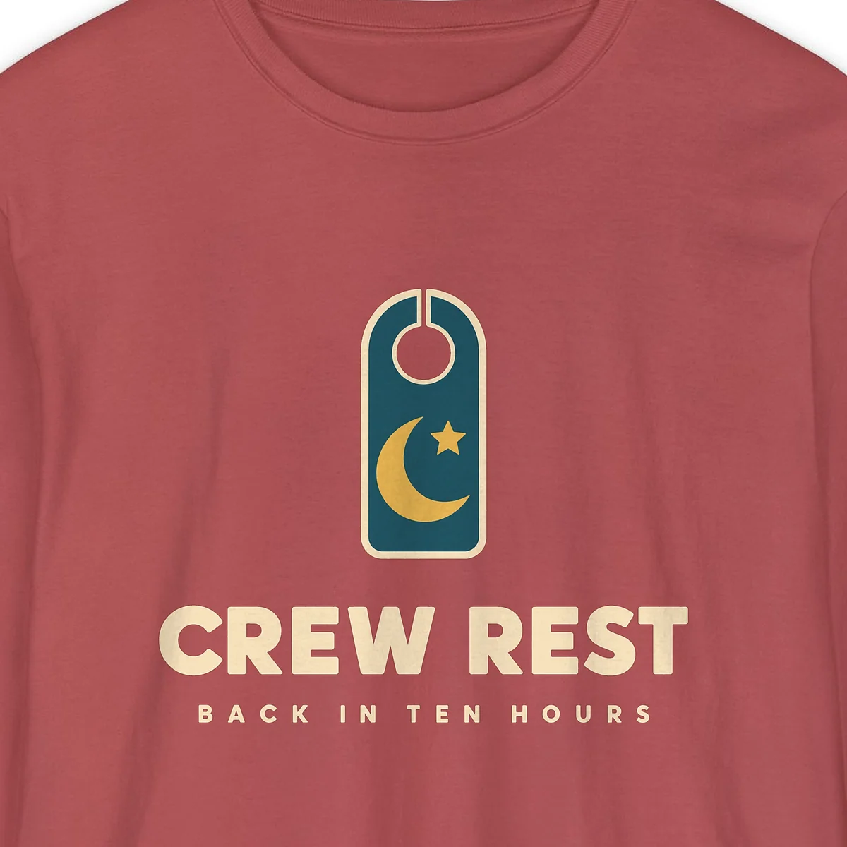 Crew Rest design on a Crimson Comfort Colors 6014 long-sleeve tee, close-up of the print