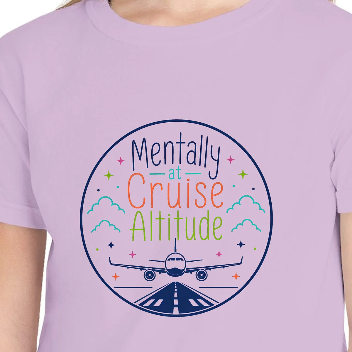 Close-up of the Cruise Altitude Round Badge design on the Orchid kids tee, Comfort Colors 9018 youth tee, with the neckline