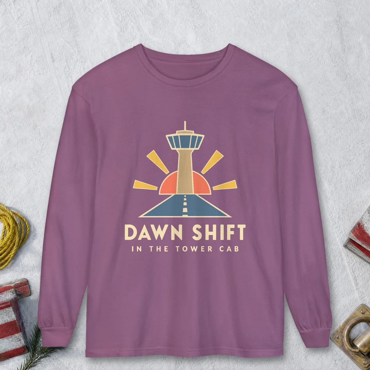 Dawn Shift Tower design on a Berry Comfort Colors 6014 long-sleeve tee, front view