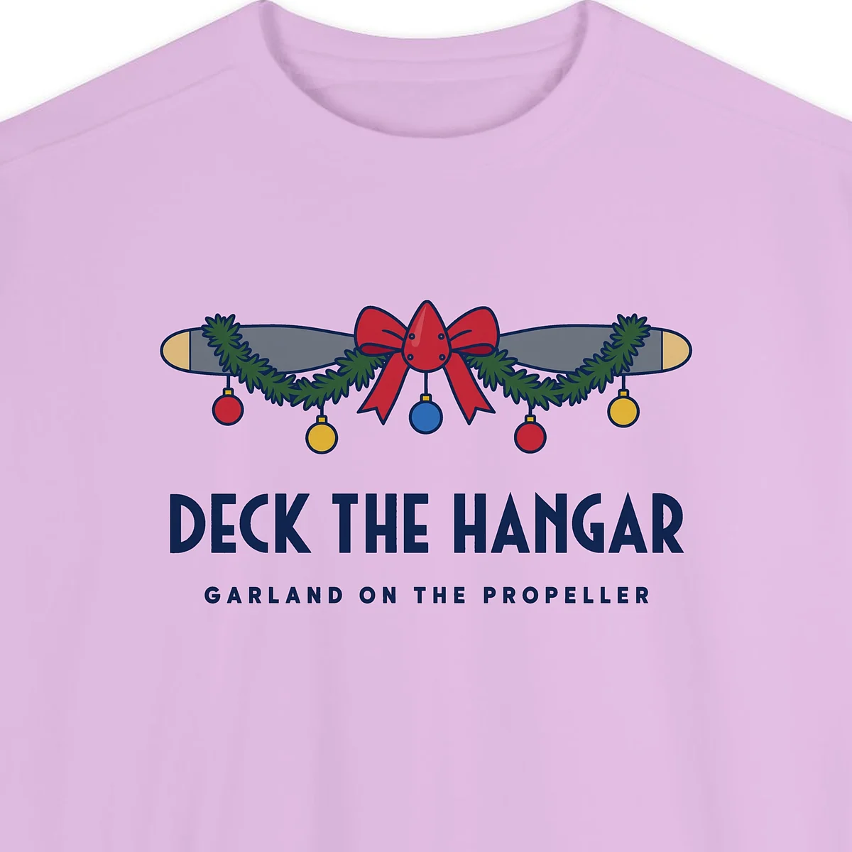 deck-the-hangar-sweatshirt-orchid-chest Close-up of the Deck the Hangar design printed on a Orchid Comfort Colors 1566 sweatshirt, with the ribbed collar