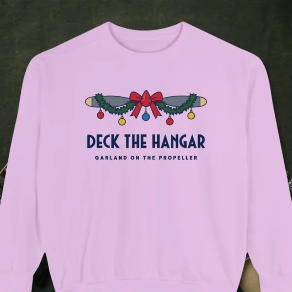 deck-the-hangar-sweatshirt-orchid-front Deck the Hangar design on a Orchid Comfort Colors 1566 sweatshirt, laid flat on a winter ground