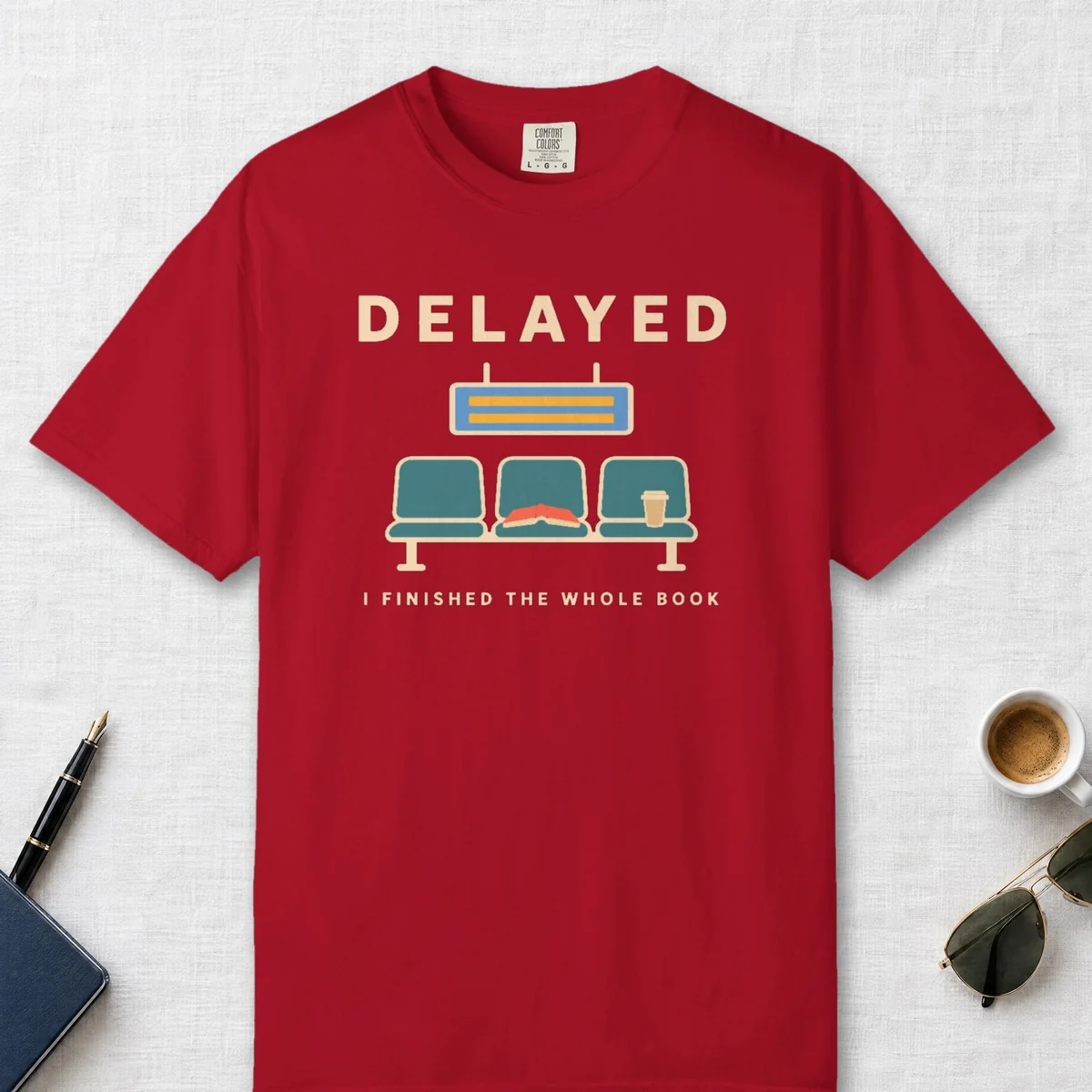 Delayed with a Book Tee in Red, front view