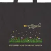 Close-up of the Fireflies and Landing Lights design printed in warm cream ink on a black canvas tote, with the top seam and handles