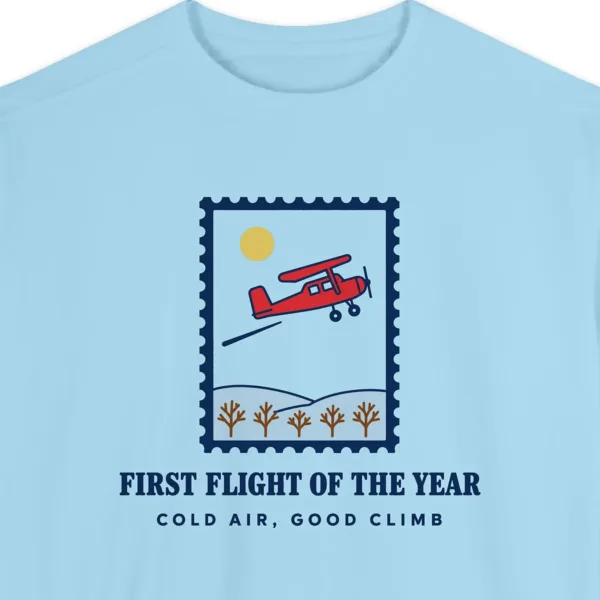 Close-up of the First Flight of the Year design printed on a Chambray Comfort Colors 1566 sweatshirt, with the ribbed collar