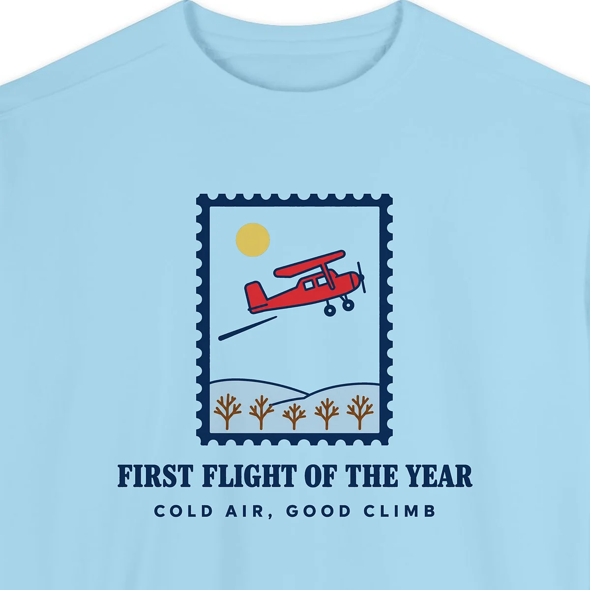 first-flight-of-the-year-sweatshirt-chambray-chest Close-up of the First Flight of the Year design printed on a Chambray Comfort Colors 1566 sweatshirt, with the ribbed collar