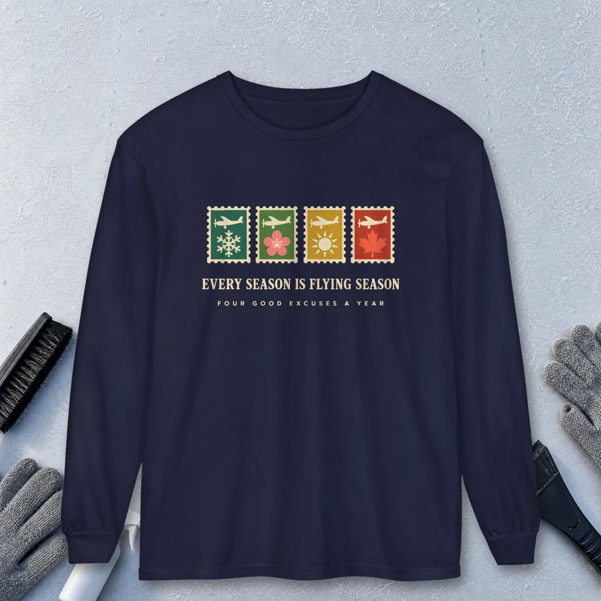 Four Season Stamps design on a True Navy Comfort Colors 6014 long-sleeve tee, front view