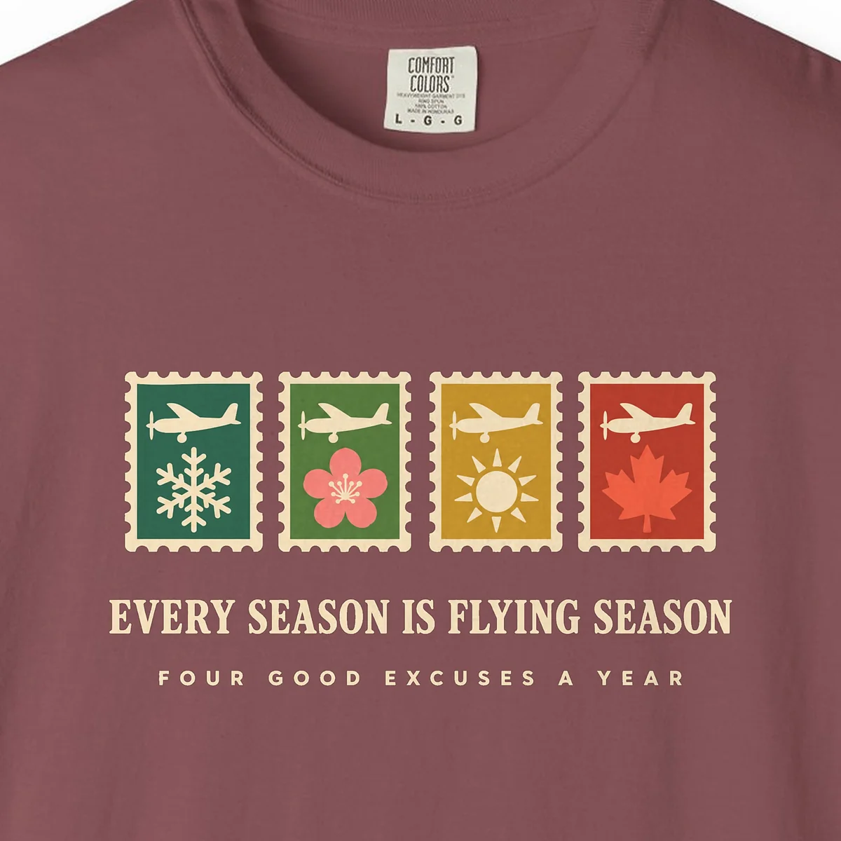 Four Season Stamps Tee in Brick, close-up