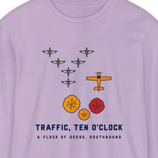 geese-at-ten-oclock-long-sleeve-tee-orchid-chest Geese at Ten O'Clock design on a Orchid Comfort Colors 6014 long-sleeve tee, close-up of the print