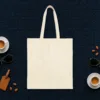 Plain back of the natural canvas tote with the Grandma Brings the Binoculars design, printed on the front only