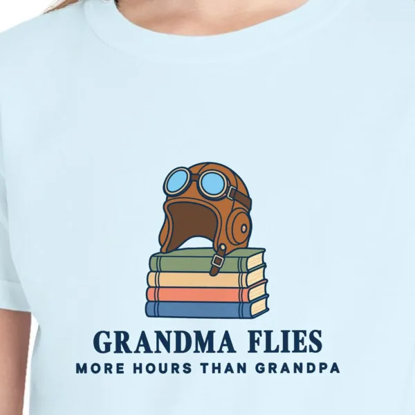 grandma-flies-kids-tee-chambray-chest Close-up of the Grandma Flies design on the Chambray kids tee, Comfort Colors 9018 youth tee, with the neckline