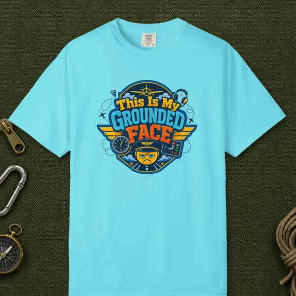 Grounded Face Crest Tee in Lagoon Blue, front view