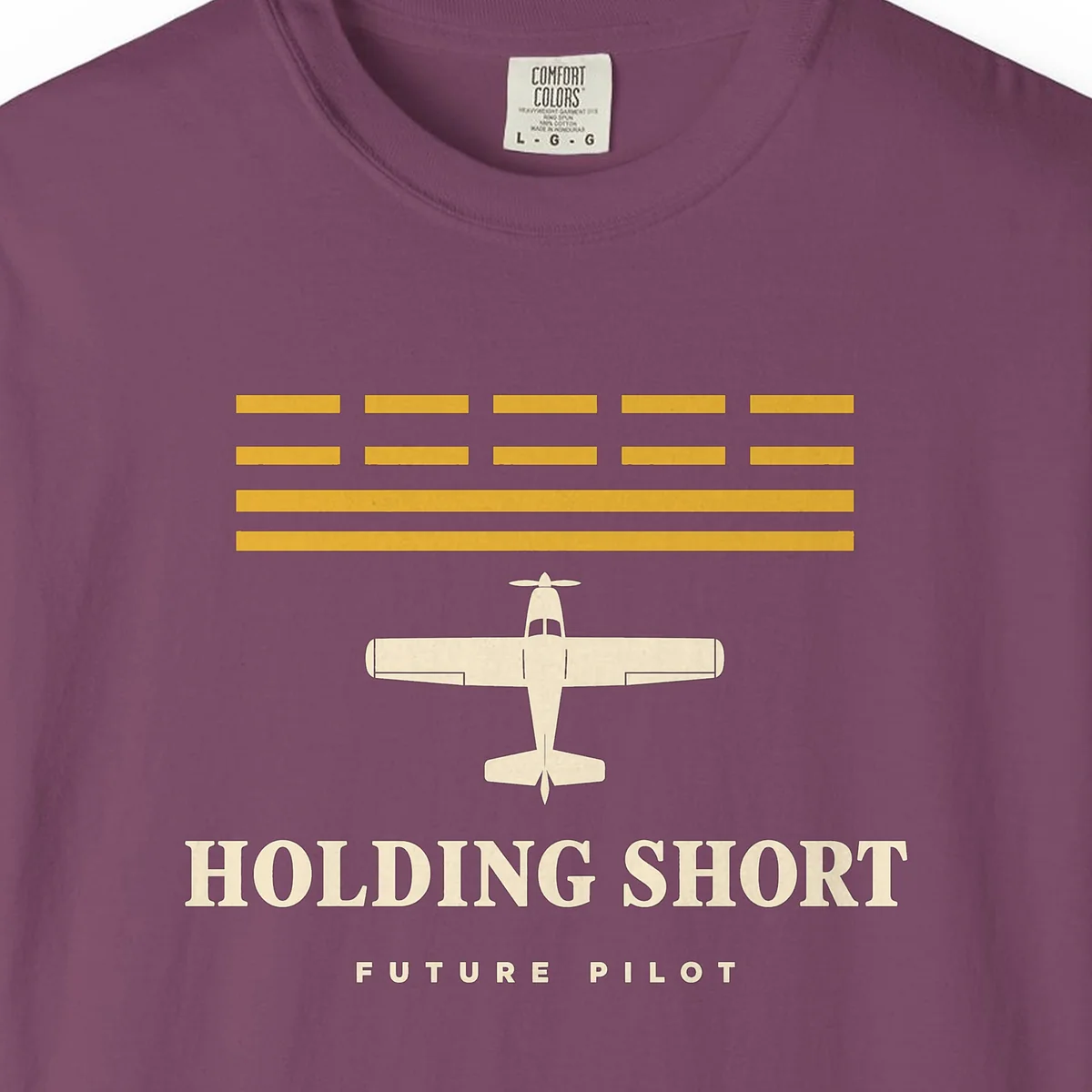 holding-short-tee-berry-chest Holding Short Tee in Berry, close-up