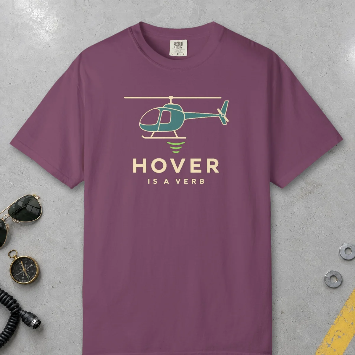 Hover Is a Verb Tee in Berry, front view