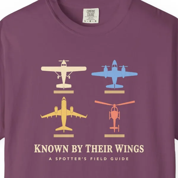 known-by-their-wings-tee-berry-chest Known by Their Wings Tee in Berry, close-up