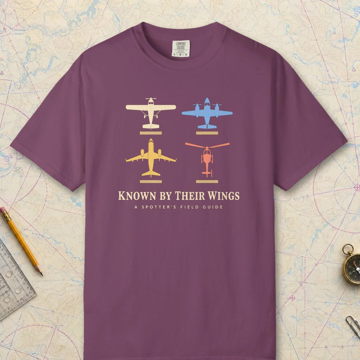 Known by Their Wings Tee in Berry, front view