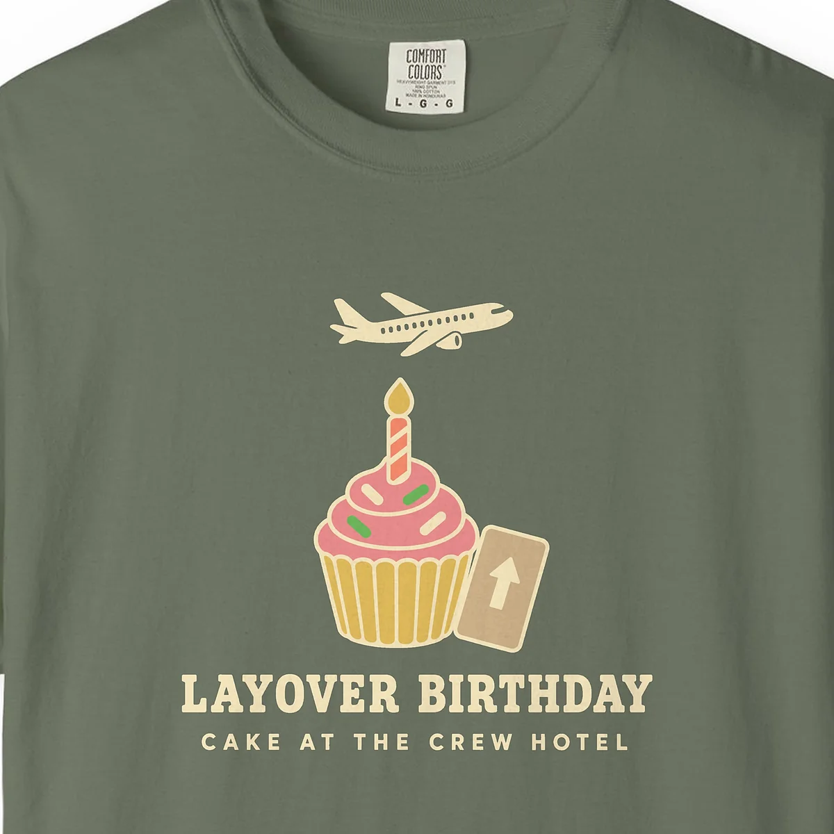 Layover Birthday Tee in Moss, close-up