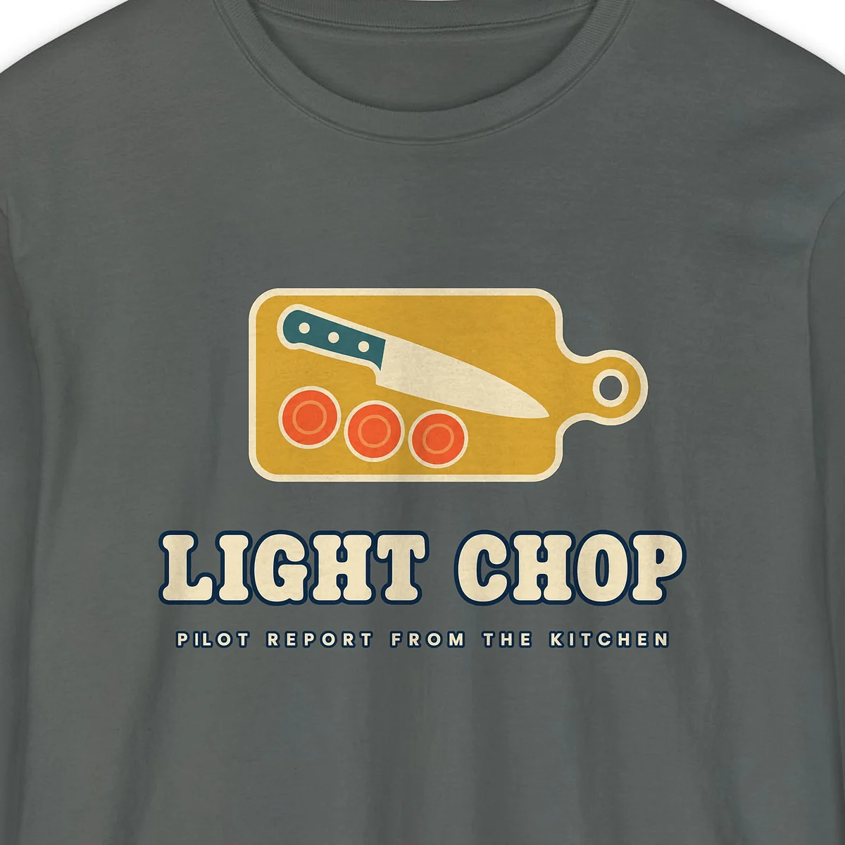 Light Chop Kitchen design on a Pepper Comfort Colors 6014 long-sleeve tee, close-up of the print