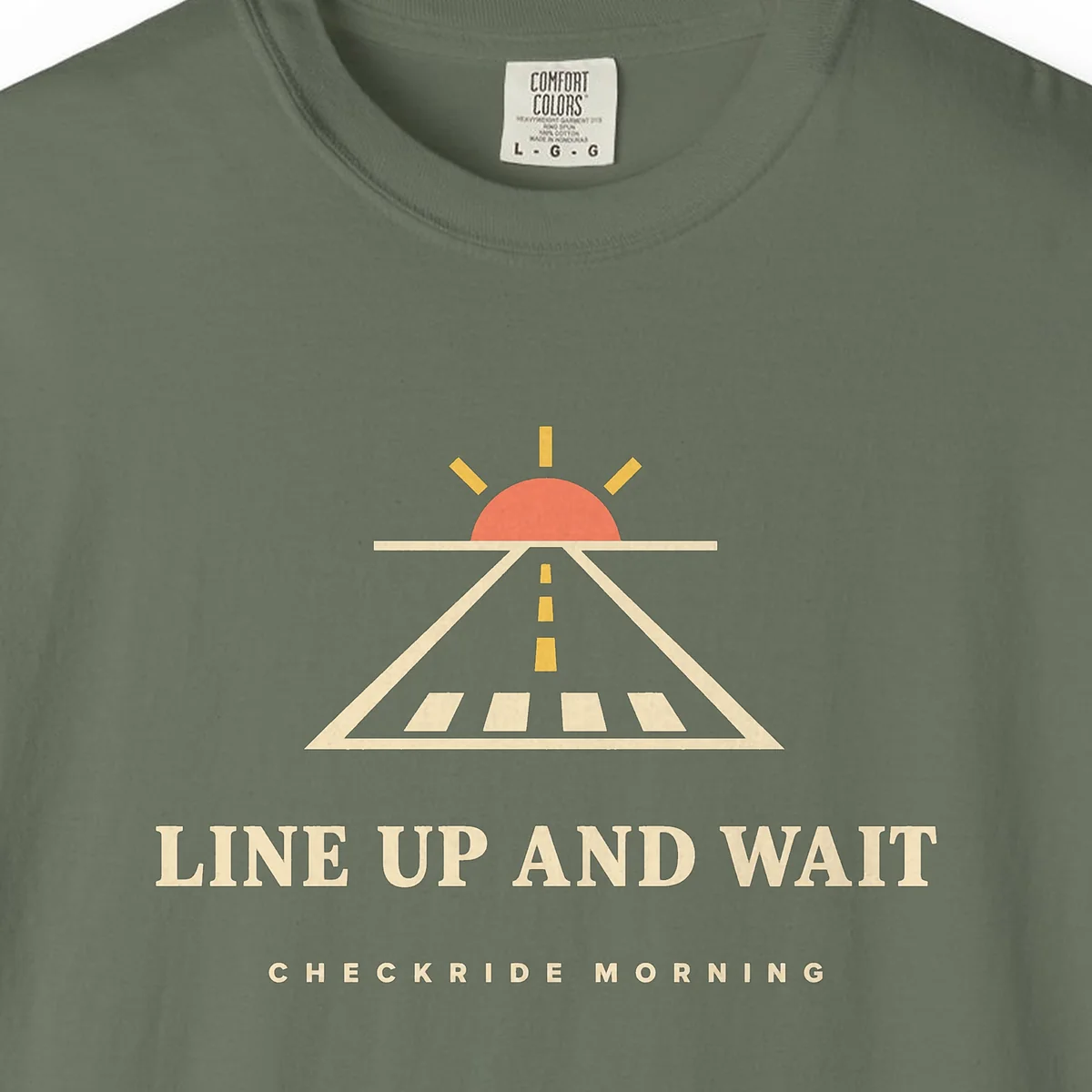 line-up-and-wait-tee-moss-chest Line Up and Wait Tee in Moss, close-up