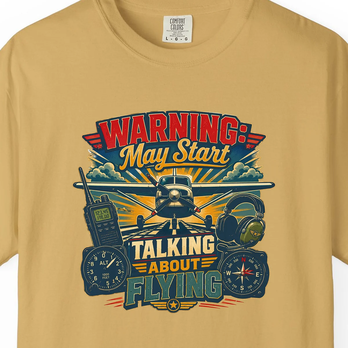 May Start Talking About Flying Vintage Tee in Mustard, close-up