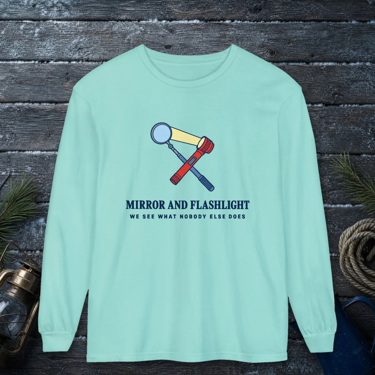 Mirror and Flashlight design on a Chalky Mint Comfort Colors 6014 long-sleeve tee, front view