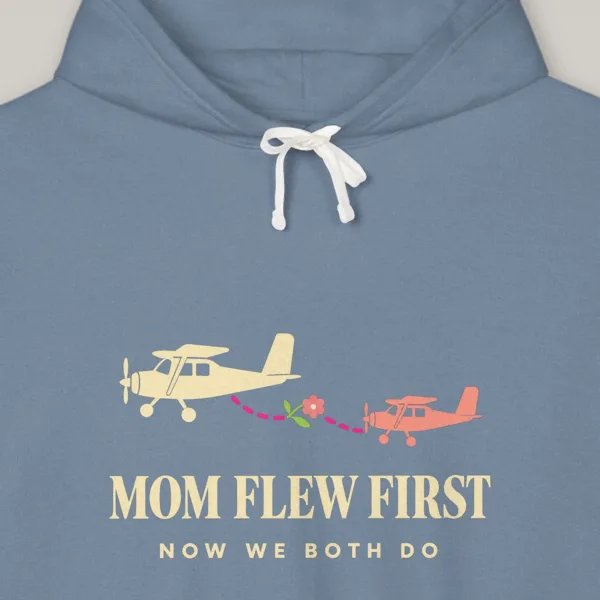 Mom Flew First design on the Comfort Colors 1467 hoodie in Blue Jean, close-up of the print
