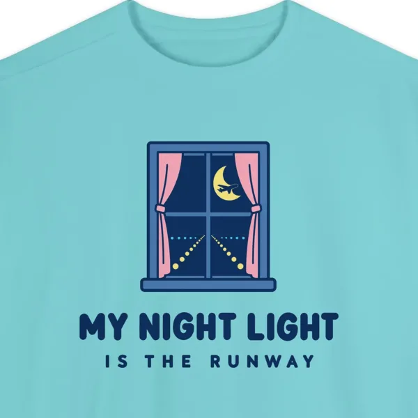 my-night-light-is-the-runway-sweatshirt-chalky-mint-chest Close-up of the My Night Light Is the Runway design printed on a Chalky Mint Comfort Colors 1566 sweatshirt, with the ribbed collar