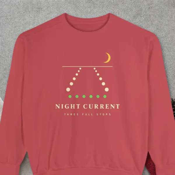 Night Current design on a Crimson Comfort Colors 1566 sweatshirt, laid flat on a winter ground