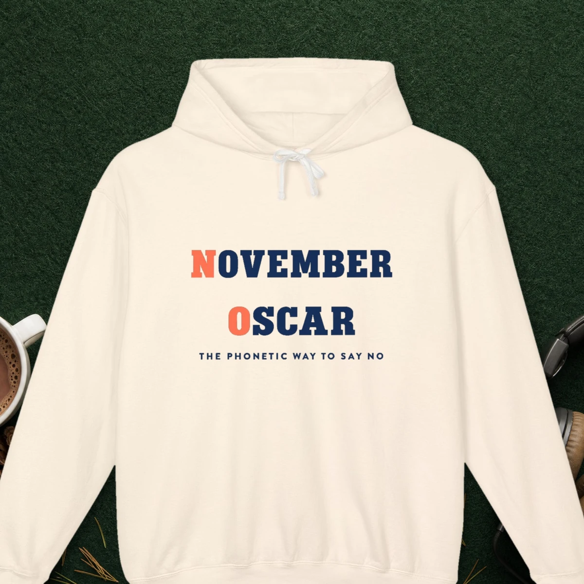 November Oscar design on the Comfort Colors 1467 hoodie in Ivory, front view