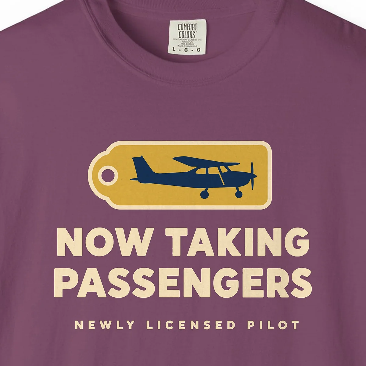 now-taking-passengers-tee-berry-chest Now Taking Passengers Tee in Berry, close-up
