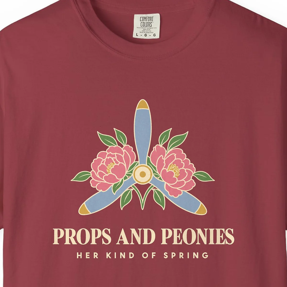 Props and Peonies Tee in Chili, close-up