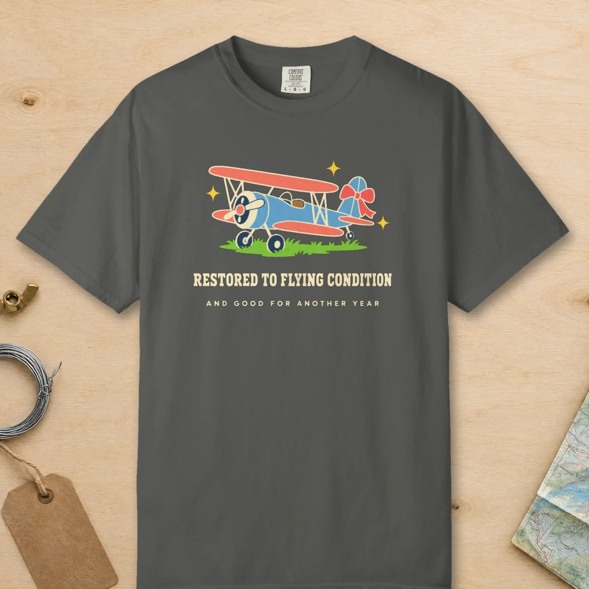 Restored to Flying Condition Tee in Pepper, front view