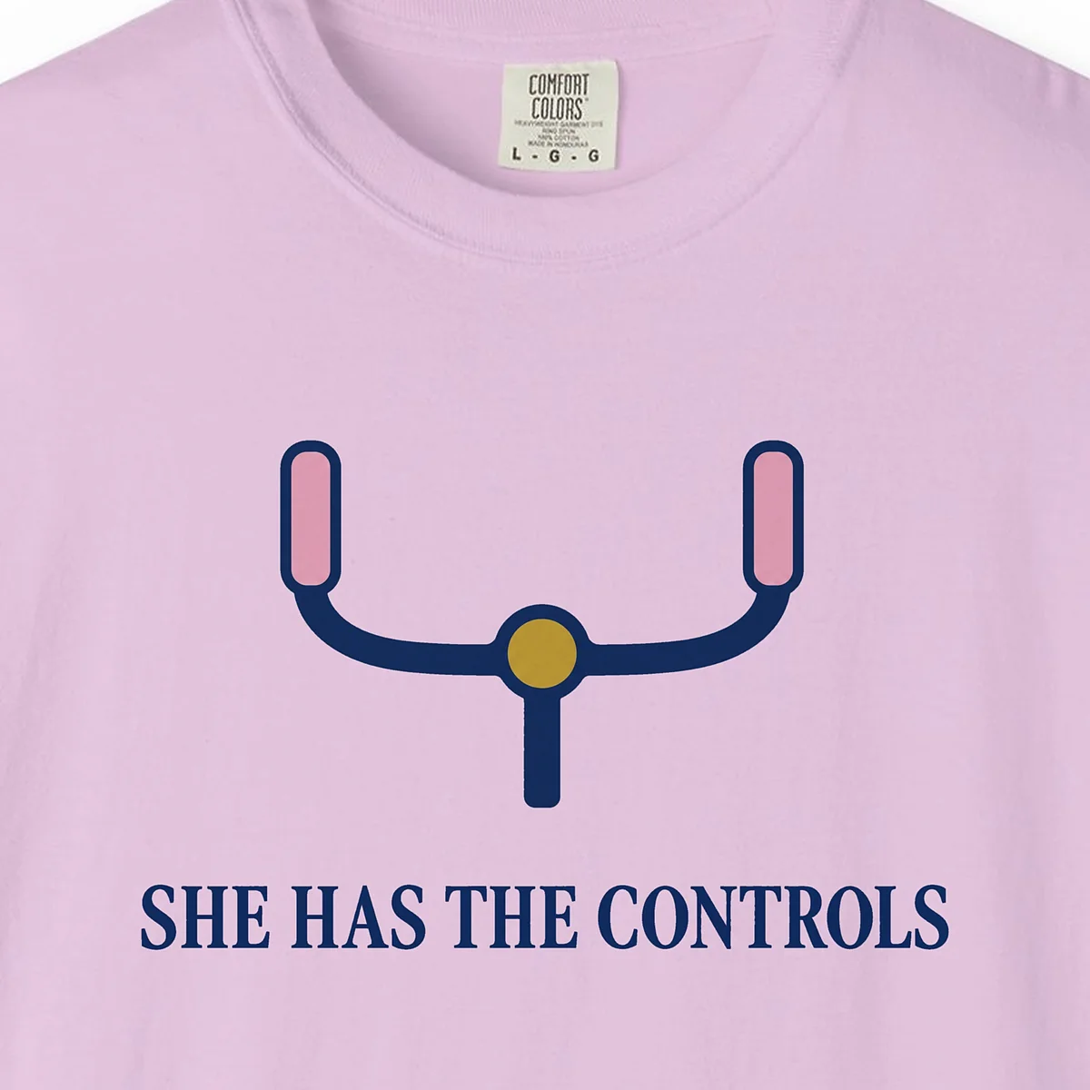 she-has-the-controls-tee-orchid-chest She Has the Controls Tee in Orchid, close-up