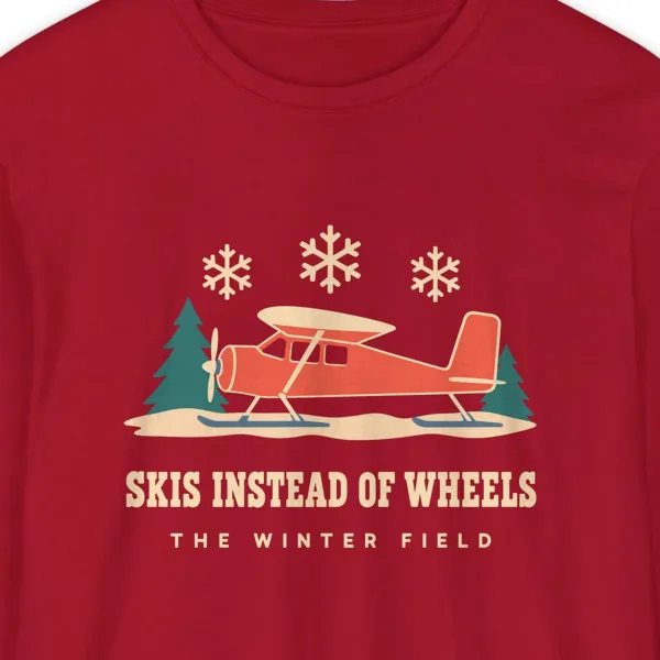 Skis Instead of Wheels design on a Red Comfort Colors 6014 long-sleeve tee, close-up of the print