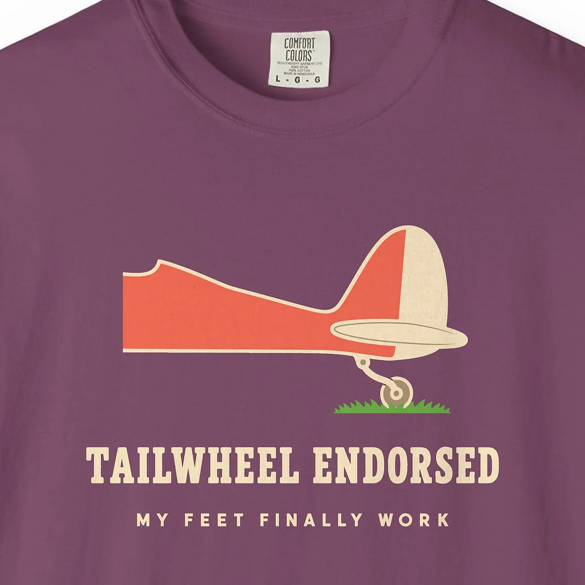 Tailwheel Endorsed Tee in Berry, close-up