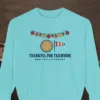 Thankful for Tailwinds design on a Chalky Mint Comfort Colors 1566 sweatshirt, laid flat on a winter ground