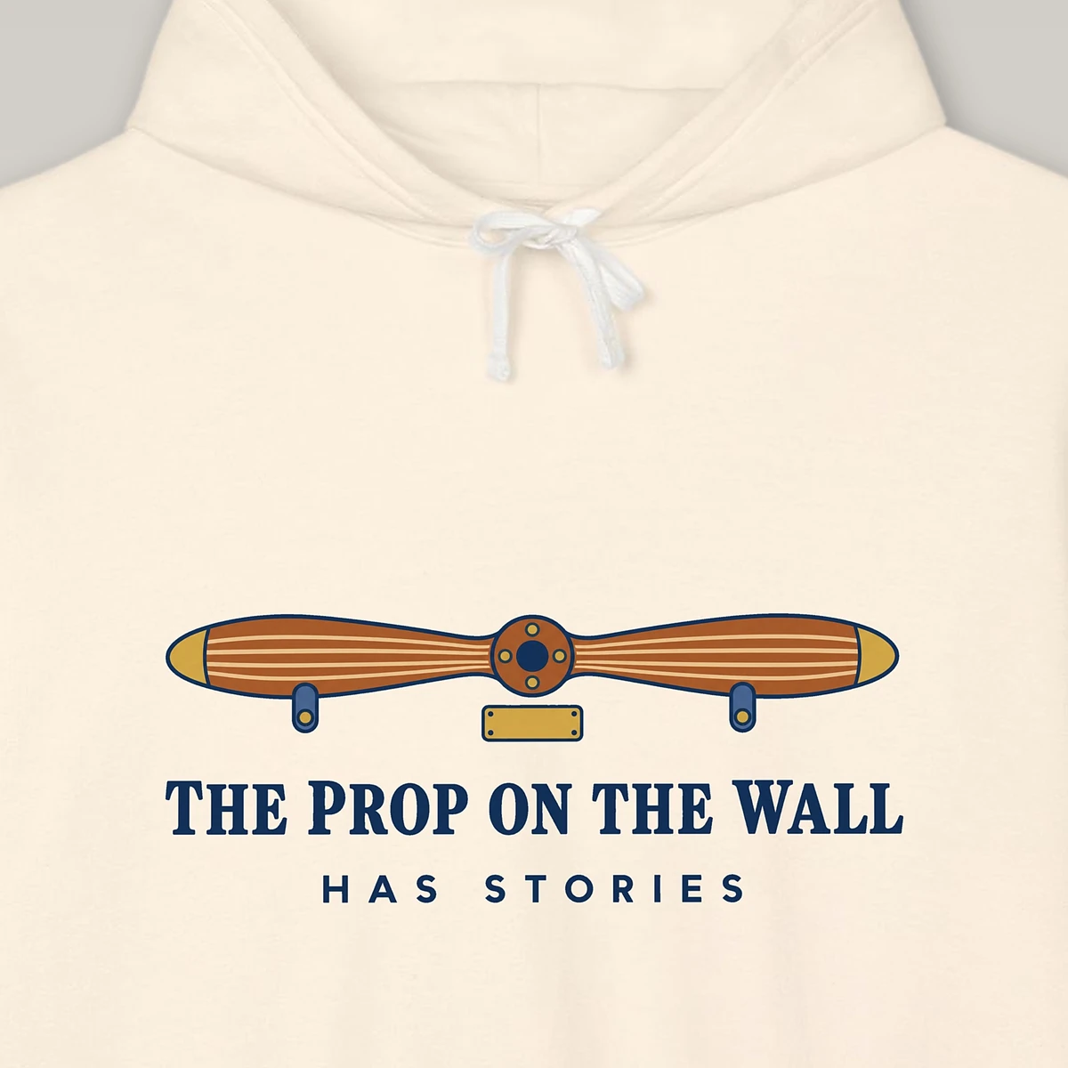 the-prop-on-the-wall-hoodie-ivory-chest-v1 The Prop on the Wall design on the Comfort Colors 1467 hoodie in Ivory, close-up of the print