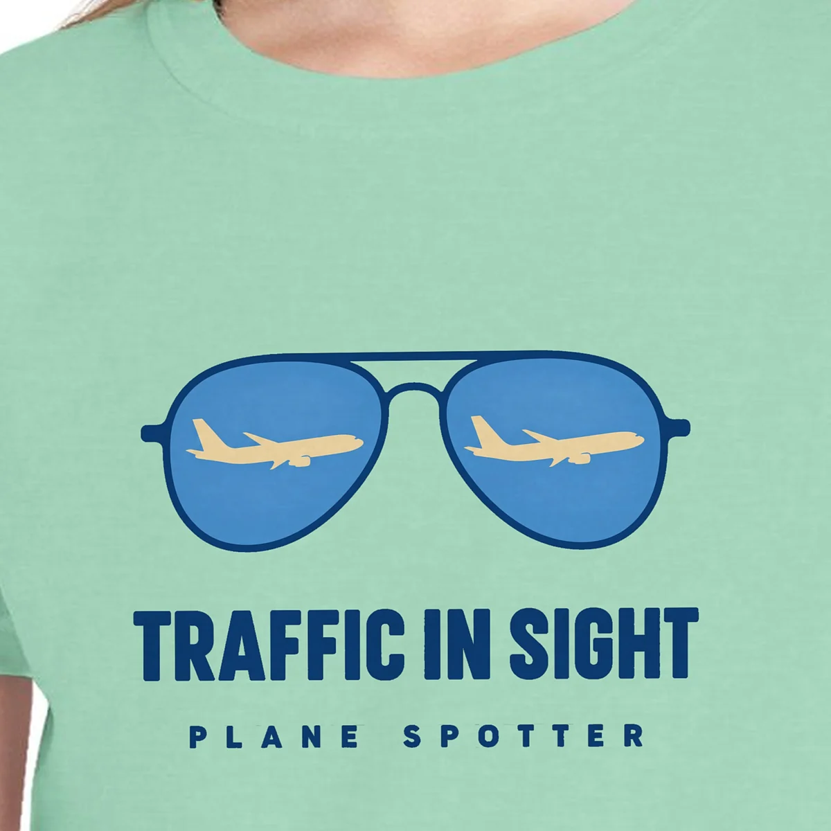 traffic-in-sight-kids-tee-island-reef-chest Close-up of the Traffic in Sight design on the Island Reef kids tee, Comfort Colors 9018 youth tee, with the neckline