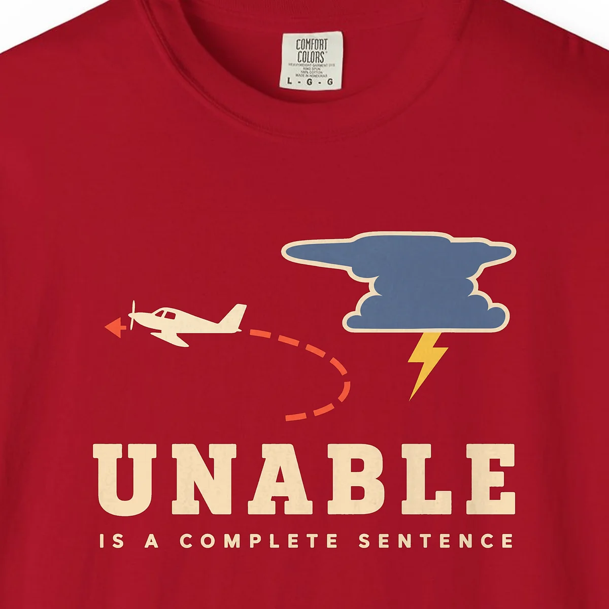 Unable Is a Complete Sentence Tee in Red, close-up