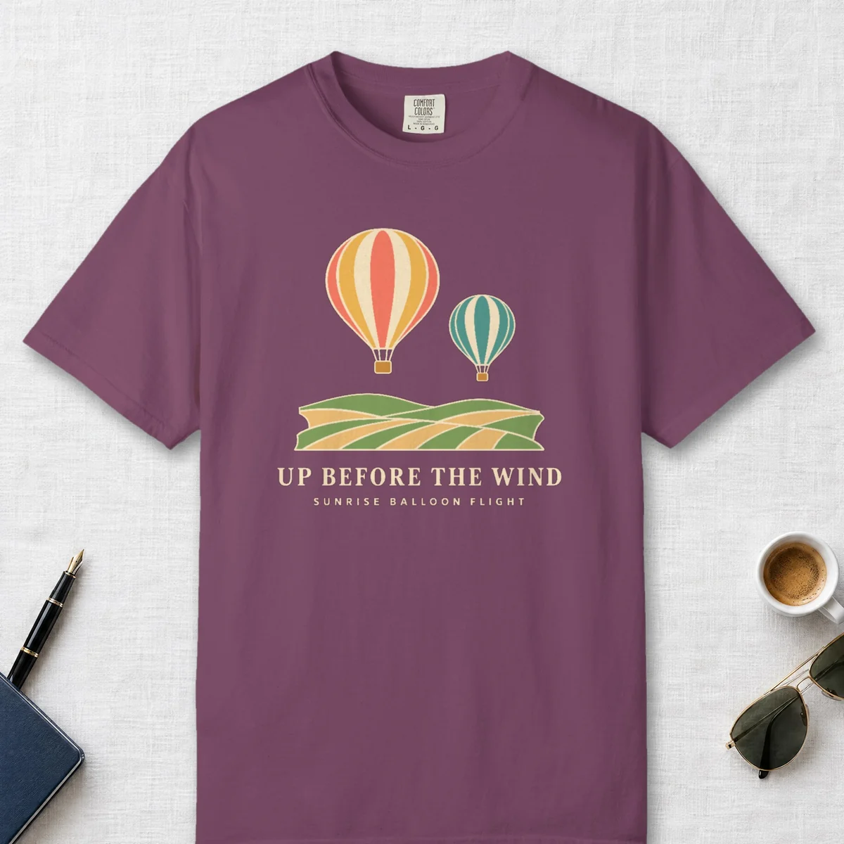 Up Before the Wind Tee in Berry, front view