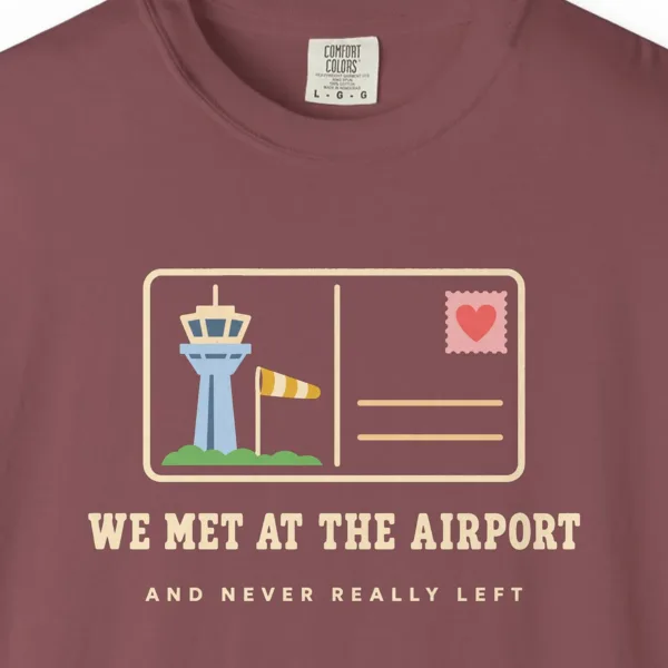 we-met-at-the-airport-tee-brick-chest We Met at the Airport Tee in Brick, close-up