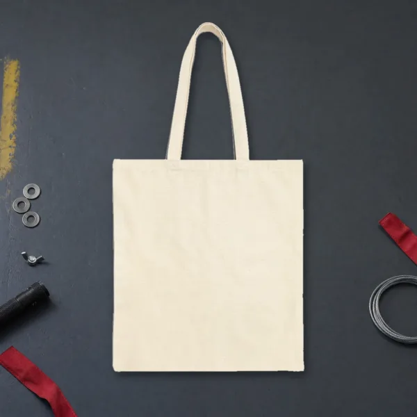 Plain back of the natural canvas tote with the We Met at the Airport design, printed on the front only