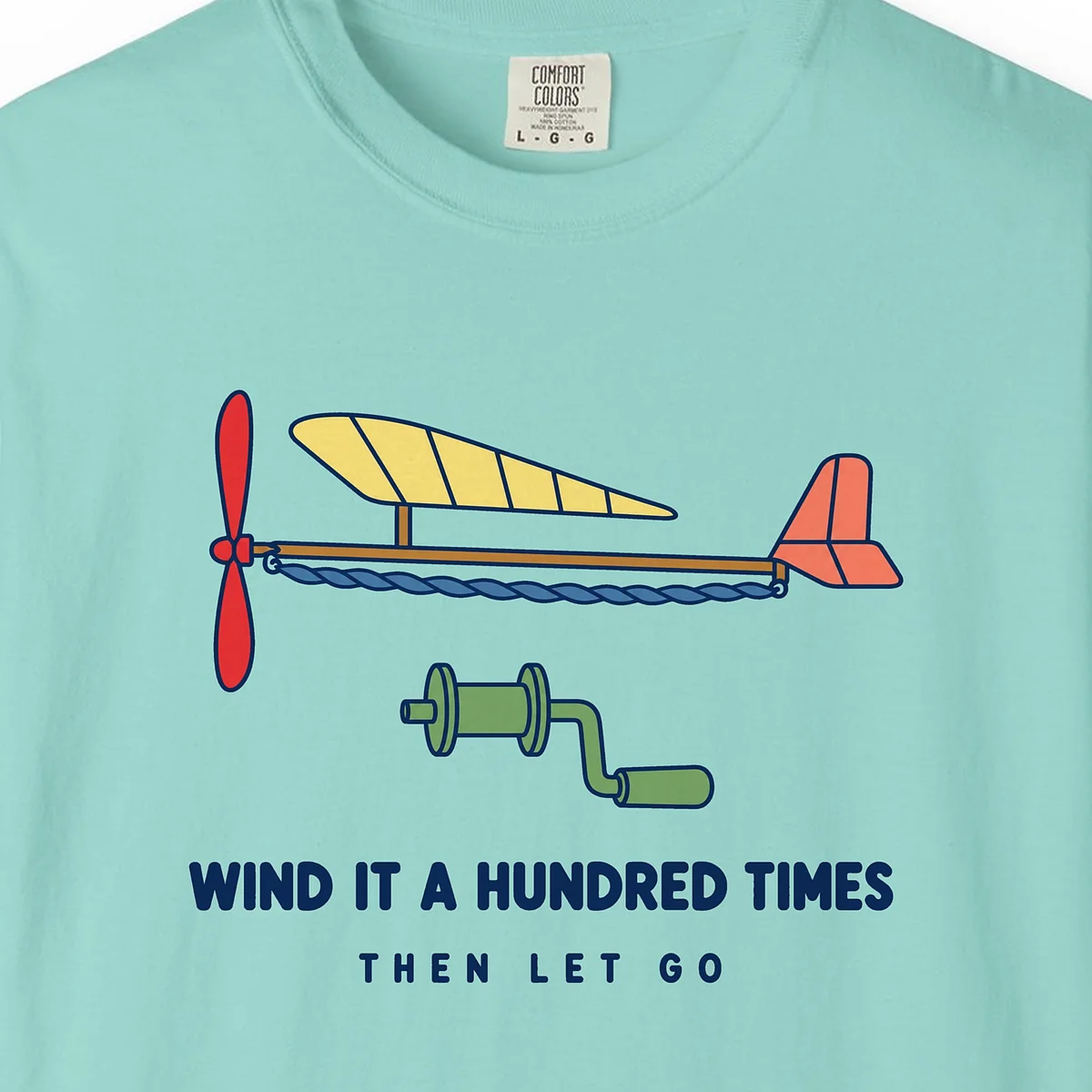 Wind It a Hundred Times Tee in Chalky Mint, close-up